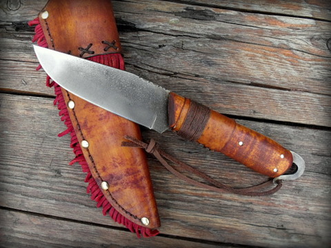 frontier clip point knife with a forged lanyard