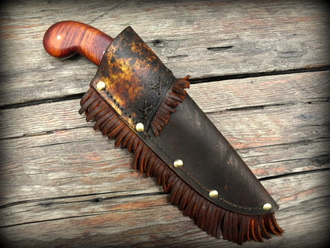 period knife with a decorated rawhide sheath