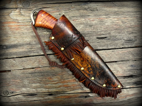 vintage stlye trade knife with a rawhide sheath