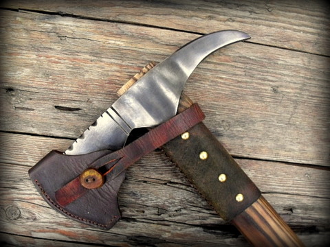 hand-forged custom tomahawk with a leather sheath