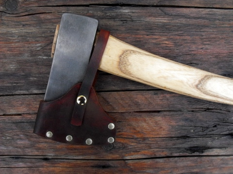 hand-forged custom-axe with a leather sheath