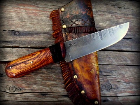 period fur trade knife with a  rawhide sheath