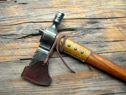 pipe axe with a leather sheath