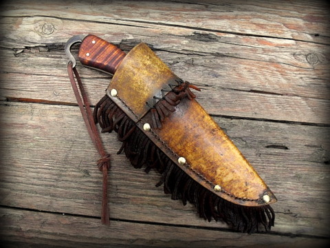 vintage stlye trade knife with a rawhide sheath