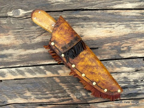 vintage stlye trade knife with a rawhide sheath