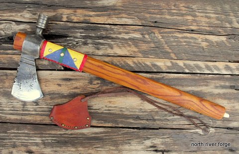 Pipe tomahawk with a parfleche wrap